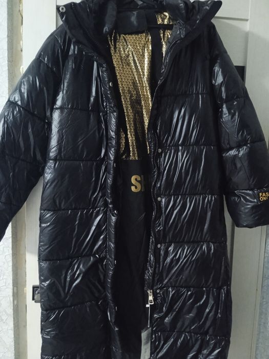 новый пуховик продам