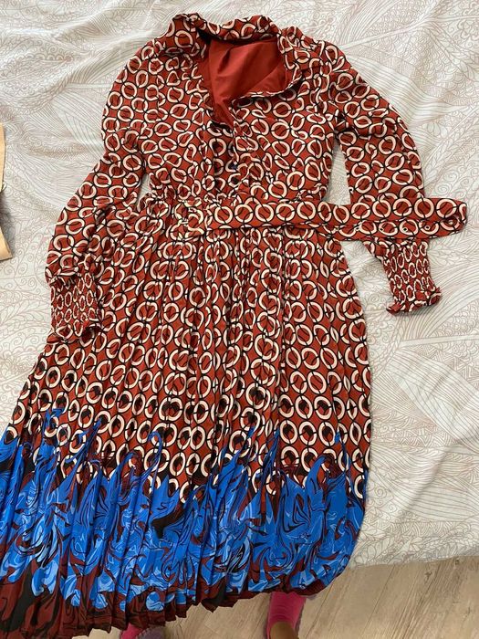 Дизайнерская  фирменная одежда.