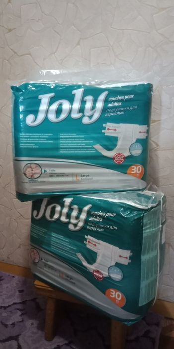 Подгузники  новые