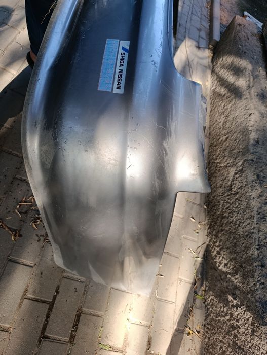 nissan a33 задний бампер
