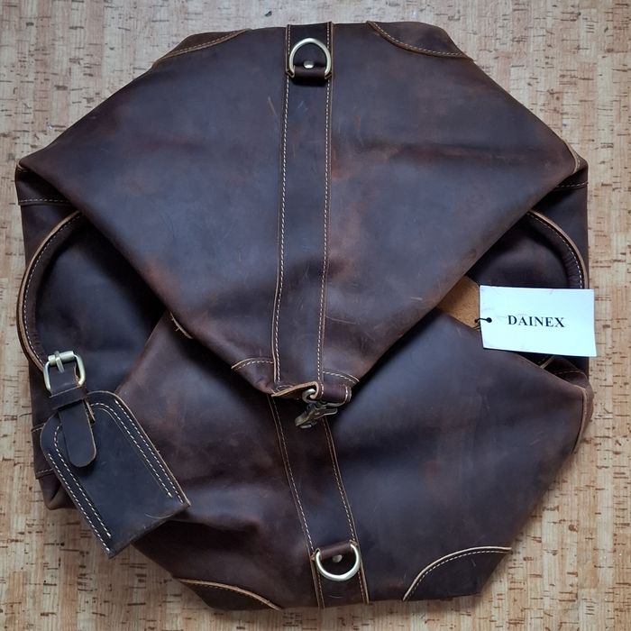 Коженая сумка DAINEX