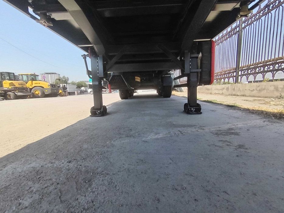 Полуприцеп бортовой контейнеровоз UzAutoTrailer