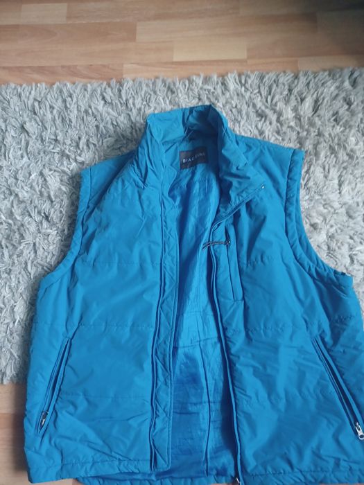 Vestă          .