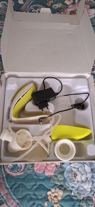 Электрический молокоотсос