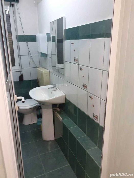 Vând două apartamente legate în Tecuci cu spațiu comercial