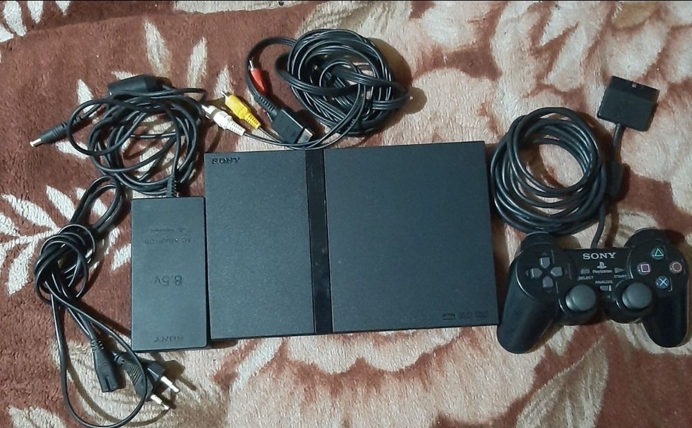 Vând PlayStation 2 slim complet în stare bună