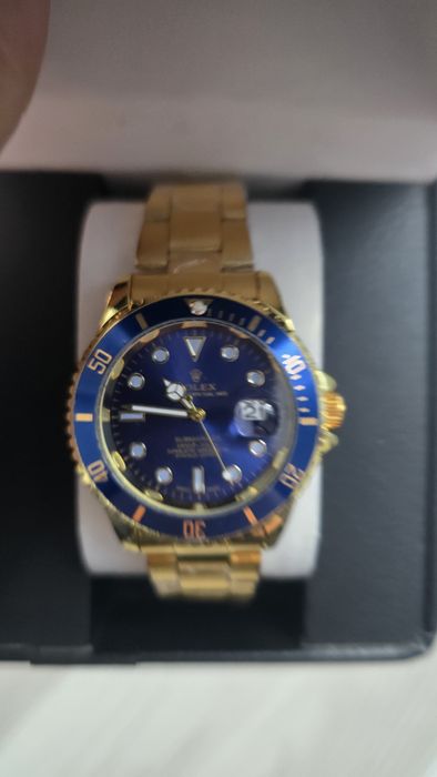 Rolex Submariner Date
Indicii vizi