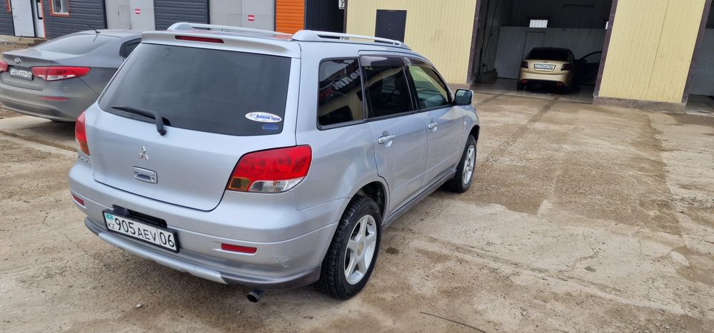 митсубиси айртрек 2003