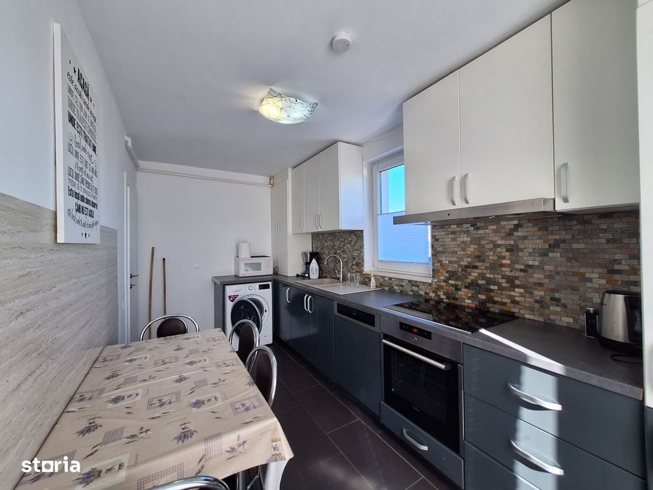 Apartament cu 3 camere, 60 mp, balcon de 20 mp, zona BMW — fotografia 2