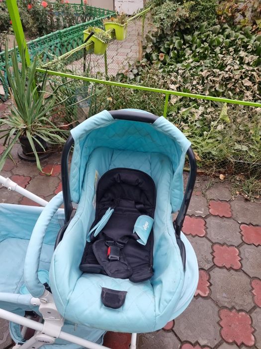 Продам коляску mige