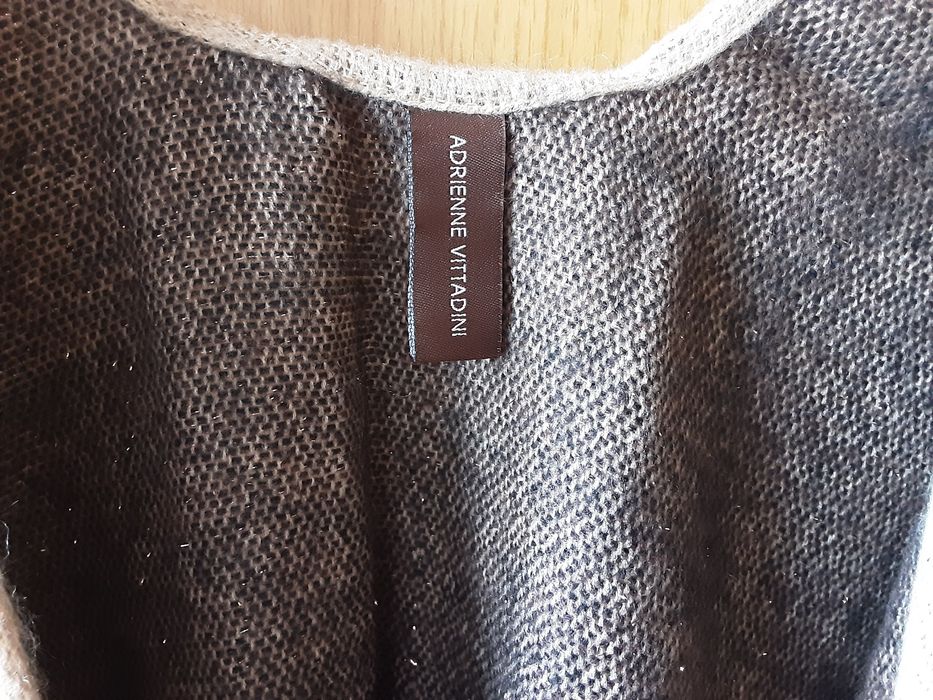 Жилетки, сако и пончо