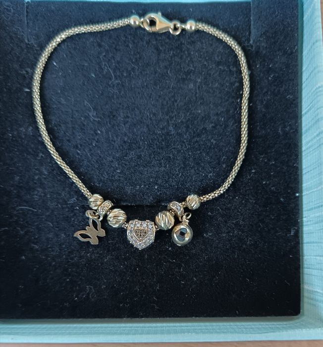 Продавам златна гривна пандора 14карата