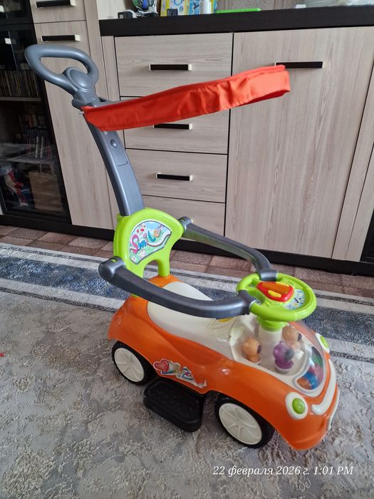 Детская каталка машинка