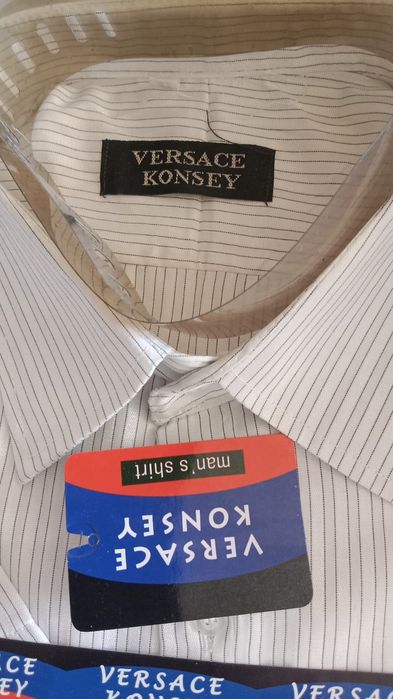 Продам Рубашки новые