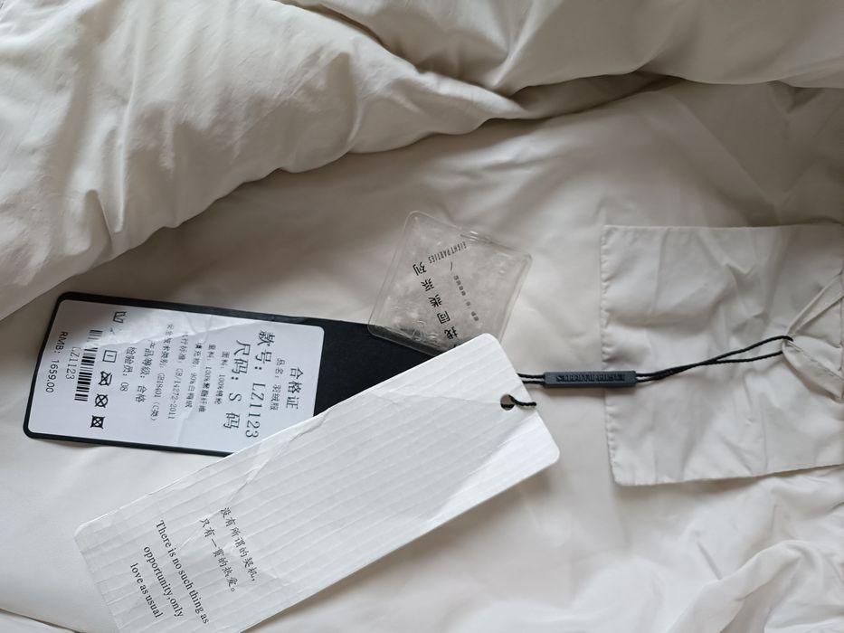 Куртка пуховик новая S размера импортная оверсайз бежевого цвета 50 ра