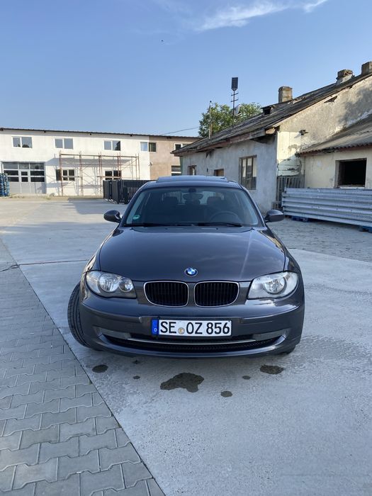 Vand bmw seria 1/navi/trapa /senzori parcare/comenzi volan