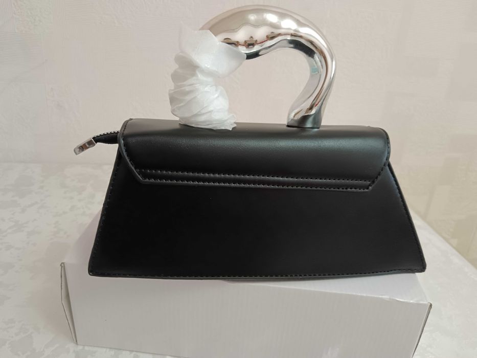 Kundalik tutishga, to'y va marosimlar uchun qulay sumka