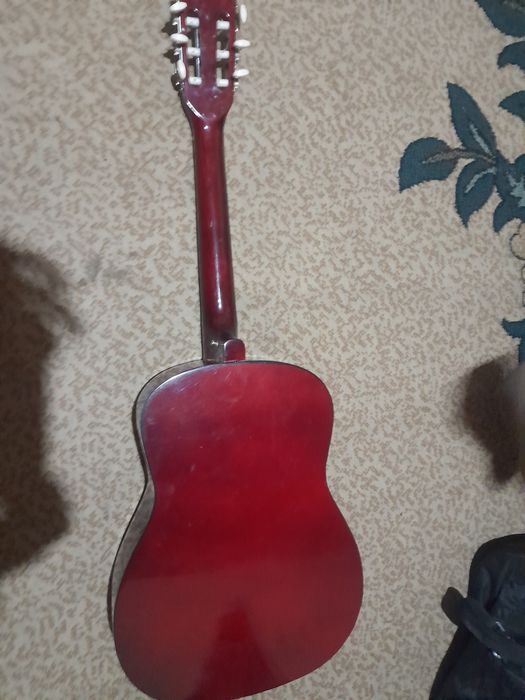 Gitara i bilan ifial xolatta