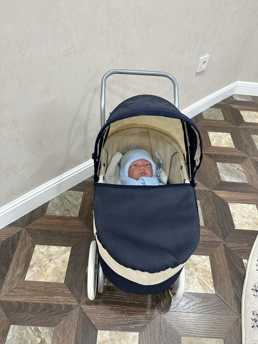 Игрушечная коляска