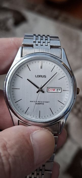 LORUS JAPAN .Ceas de mînă bărbătesc cu baterie și bŕățară metalică.