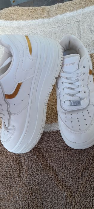 Bershka platform sneakers with Metallica details