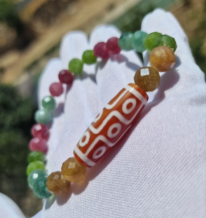 Браслеты с Бусинами Дзи.