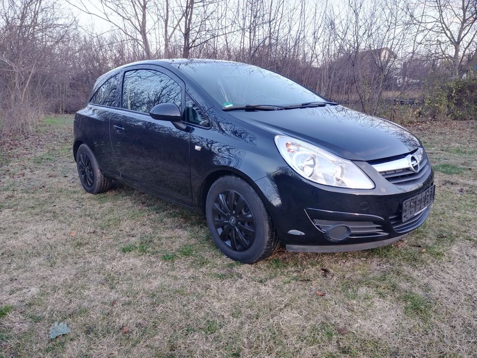 Opel Corsa 1.4i cu 87 cp,E5,an 2012,incalzire volan si scaune,AC