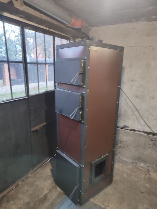 Комбиниран котел  за дърва и пелети