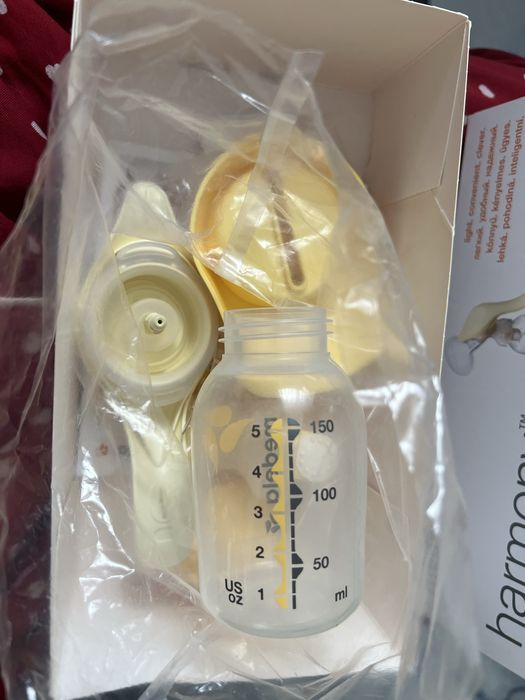 Молокоотсос medela