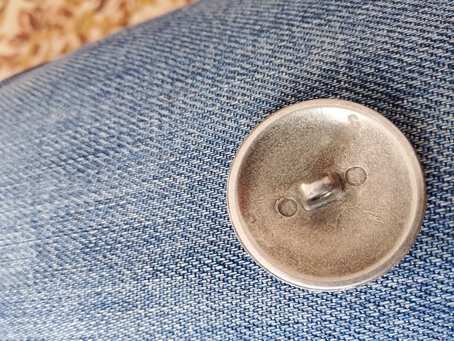 Серебряная пуговица мундира