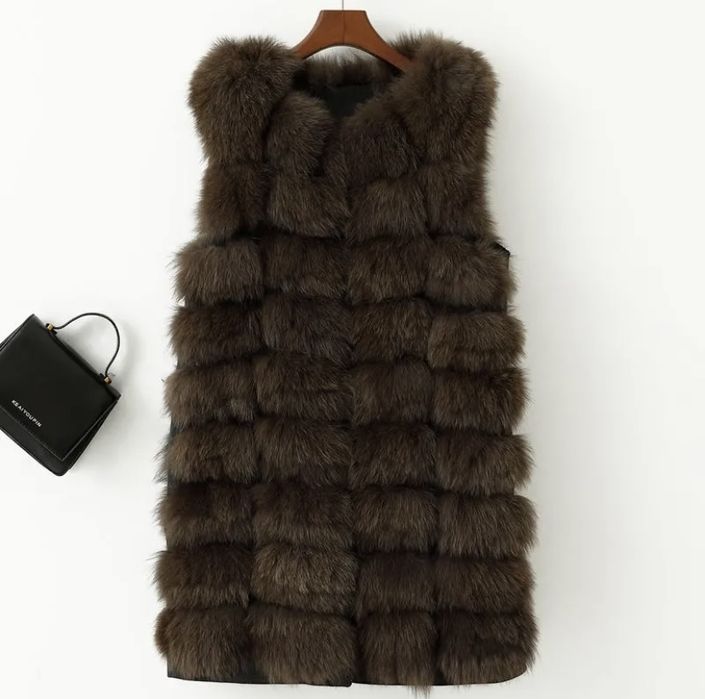 Меховая жилетка модная