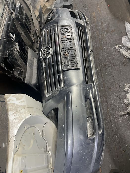 Передний бампер Тойота авенсин