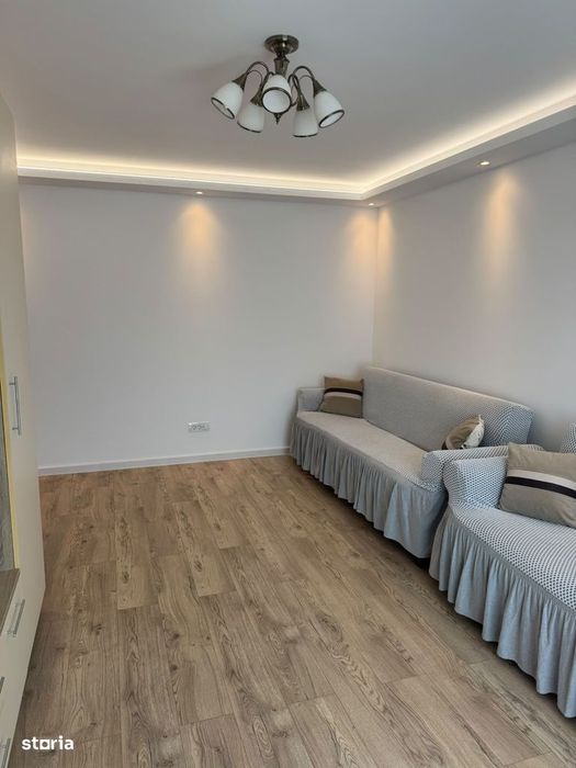 Inchiriere 3 camere, cu loc de parcare, totul nou