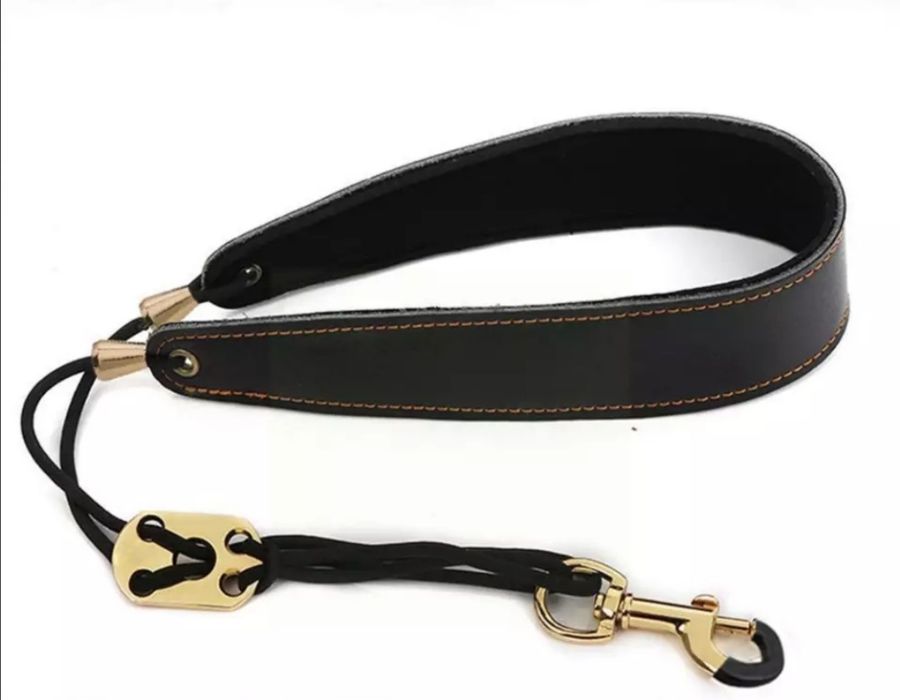 Curea  saxofon gâtar