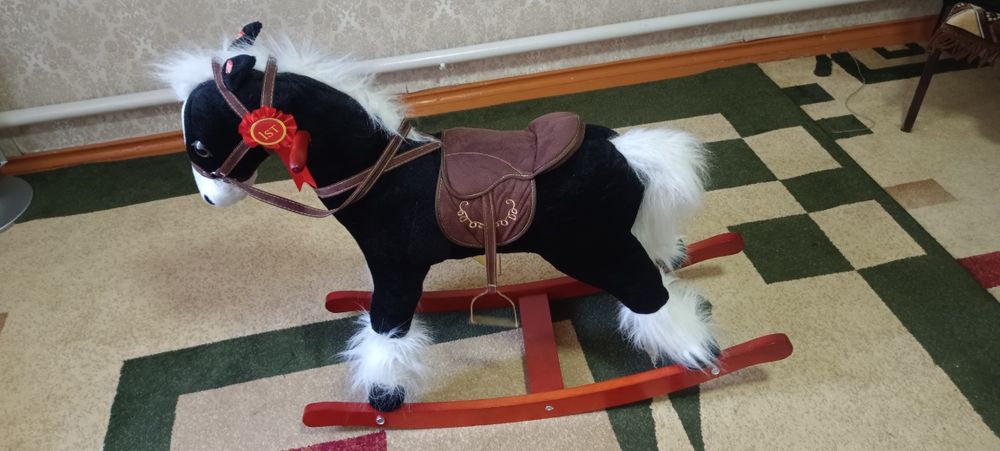 Лошадка мызыкальная игрушка новая