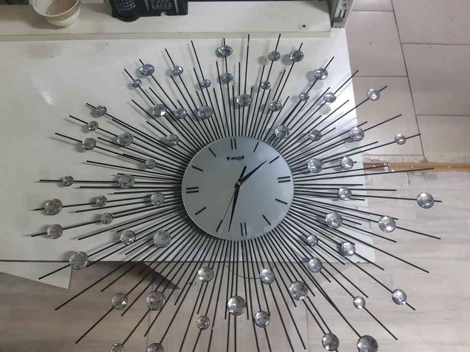 Продам часы солнце.