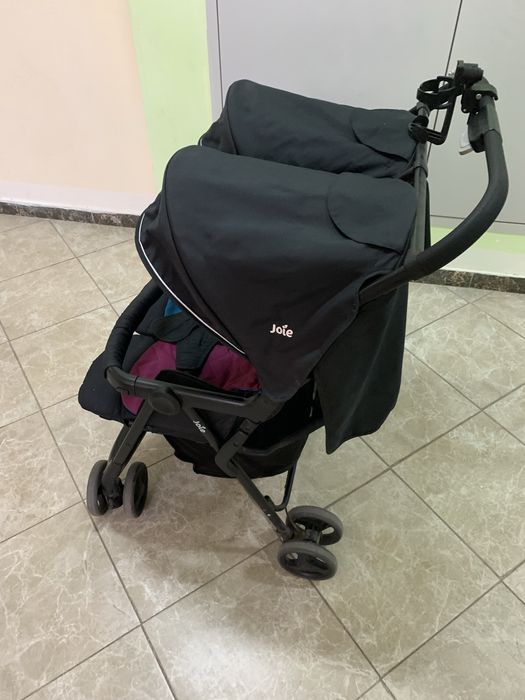 Коляска для двойни (близняшек)