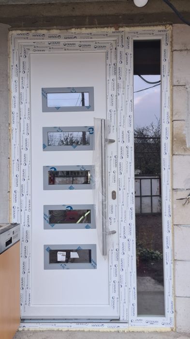 Uși pvc cu geam termopan