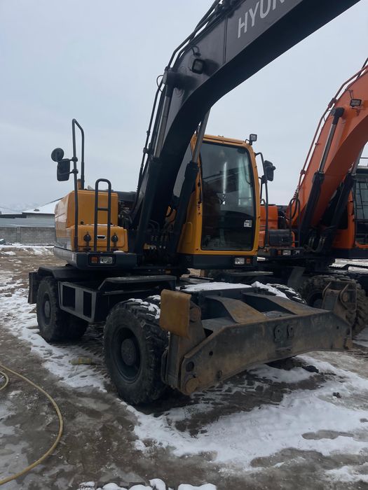 Аренда колесного экскаватора 140