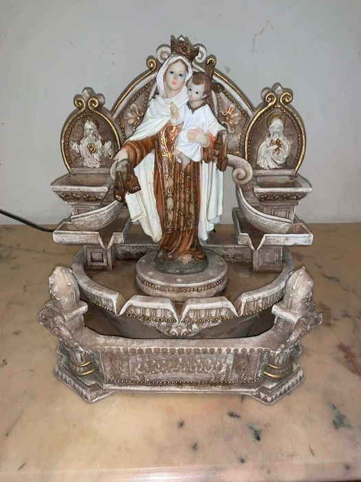 Cismea Fantana arteziana cu tenta religioasa