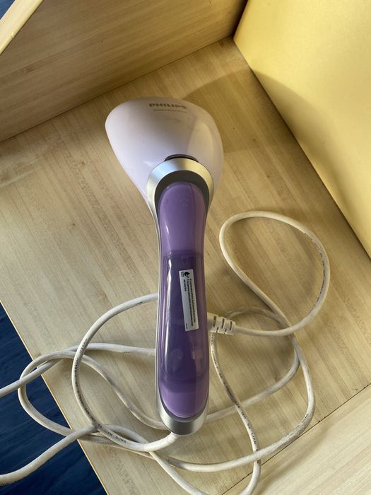Уред за вертикално гладене Philips
