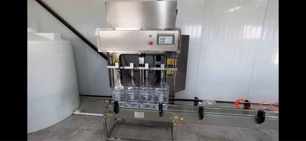 Розлив воды от 0,3л до 10л. Сув куйиш линияси 0,3л дан 10 литргача.