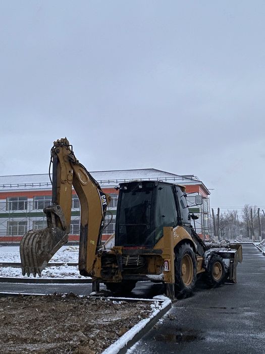 Экскаватор погрузчик