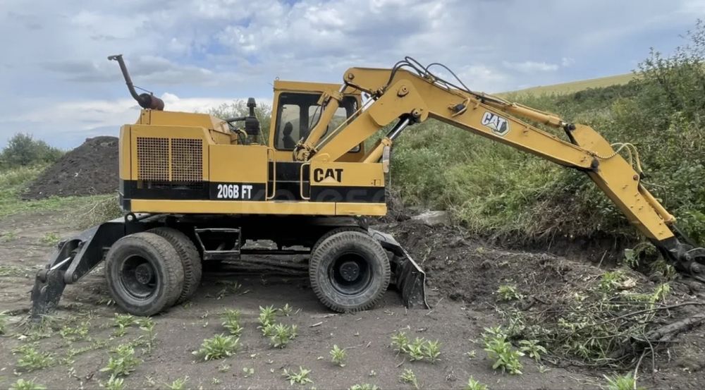Продам экскаватор CAT