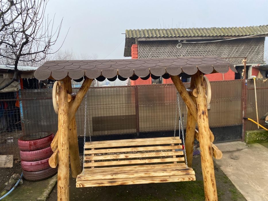 Balansoar  rustic  din  lemn  masiv  bușteni  cu 2 leagăne