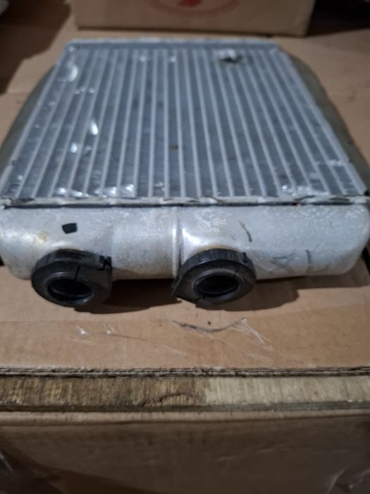 Радиатор печки Опель Астра G