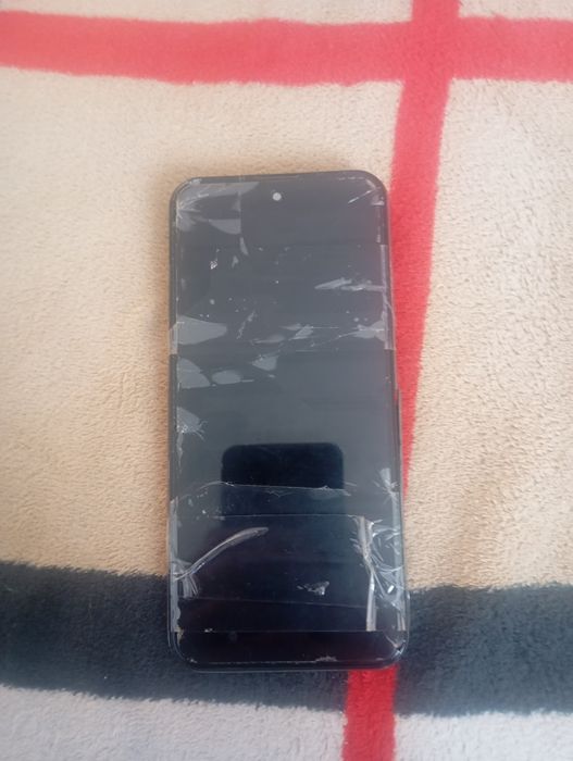 Продам телефон WQO