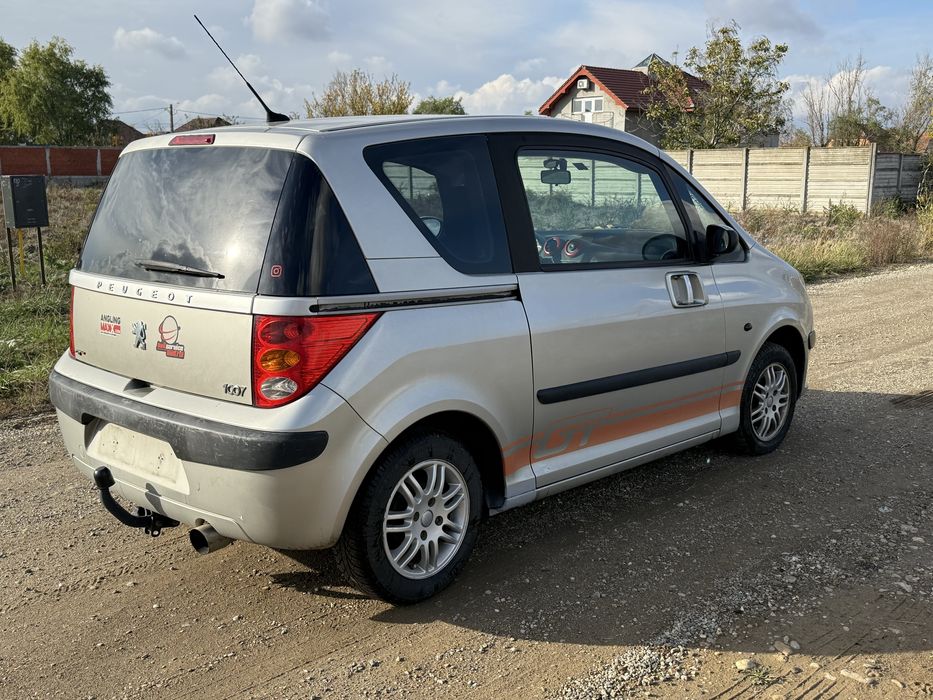 Peugeot 1007 • Diesel 1.4 • Usi automate