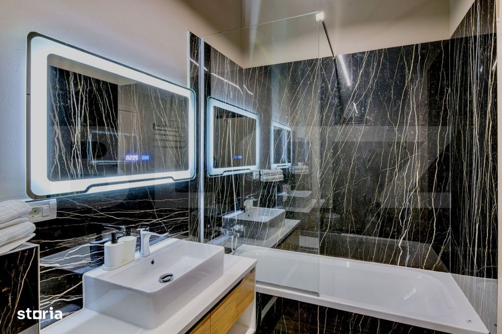 Apartament cu 3 camere, 80 mp, 2 bai, terasa 11 mp, zona Centrala