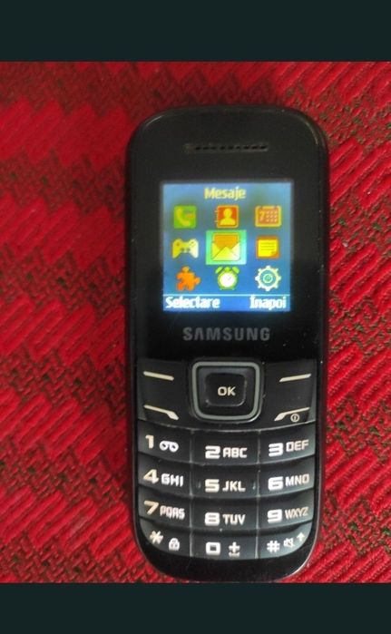 Telefon mobil cu taste in bună stare de funcționare, bateria a fost schimbată.